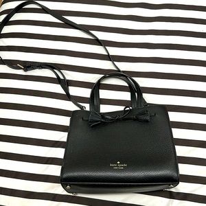 Kate Spade black satchel with a bow. Mid size barely used
